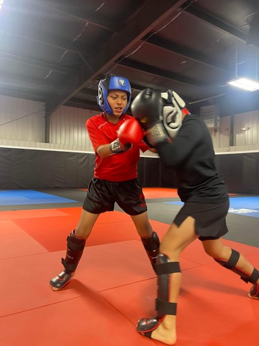 Making Martial Arts Latino Champions in Asheville Punching asheville multicultural blog