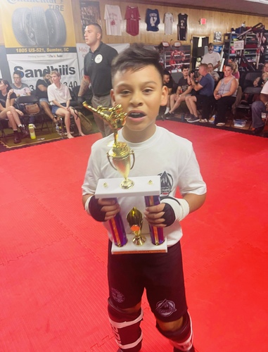 Making Martial Arts Latino Champions in Asheville Trofeo asheville multicultural blog